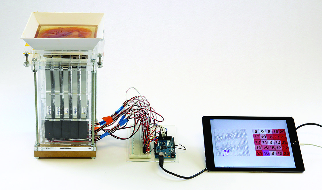 Photograph of the actuator assembly with an epoxy cast
tile on the upper platform (left), the Arduino microcontroller and circuit (middle), and the digital interface developed in Grasshopper for Rhinoceros 5.0 (right)