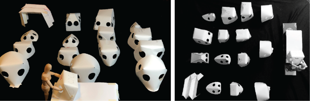 Picture of bristol paper models made during the iterative process