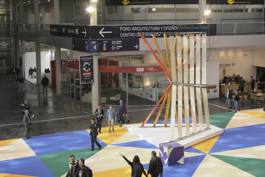 Picture of the ceramic tower, people passing by