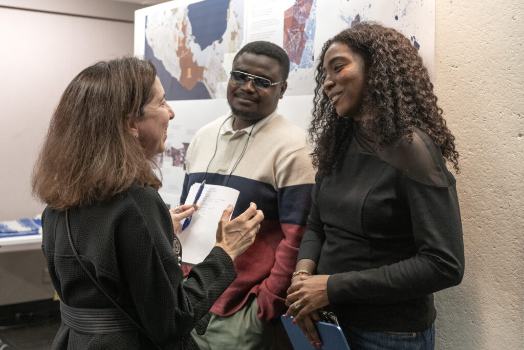 Lorena Bello Gomez speaking with Lys following the symposium