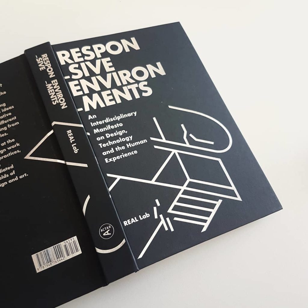 black book with silver text on the cover