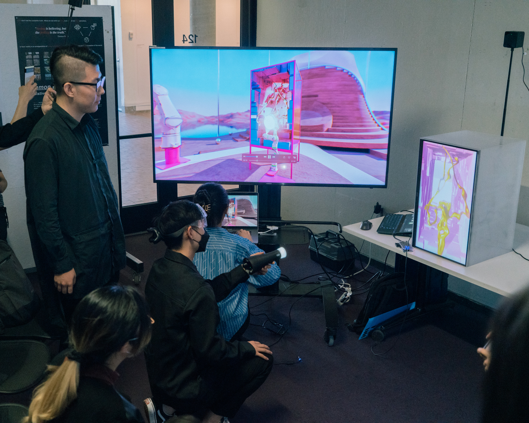 students interacting with a screen