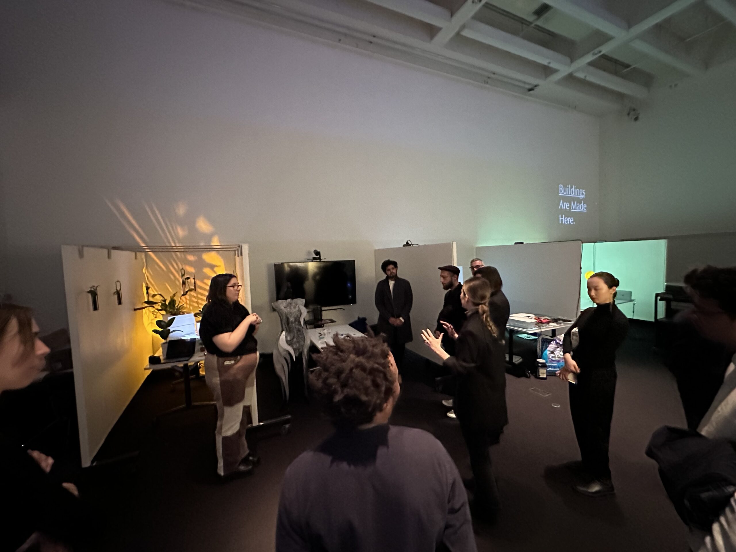 Students presenting in a large auditorium