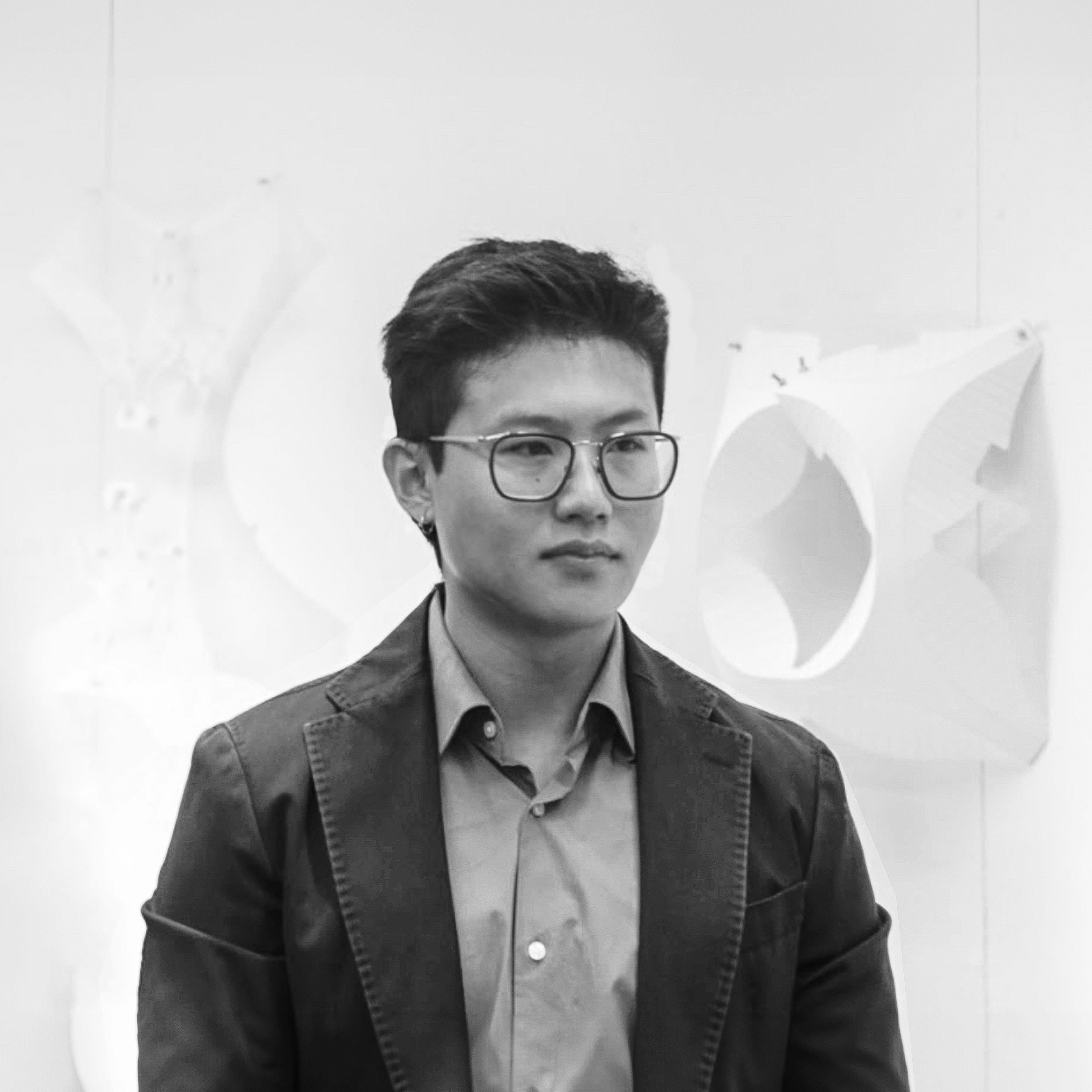 Young asian man with glasses